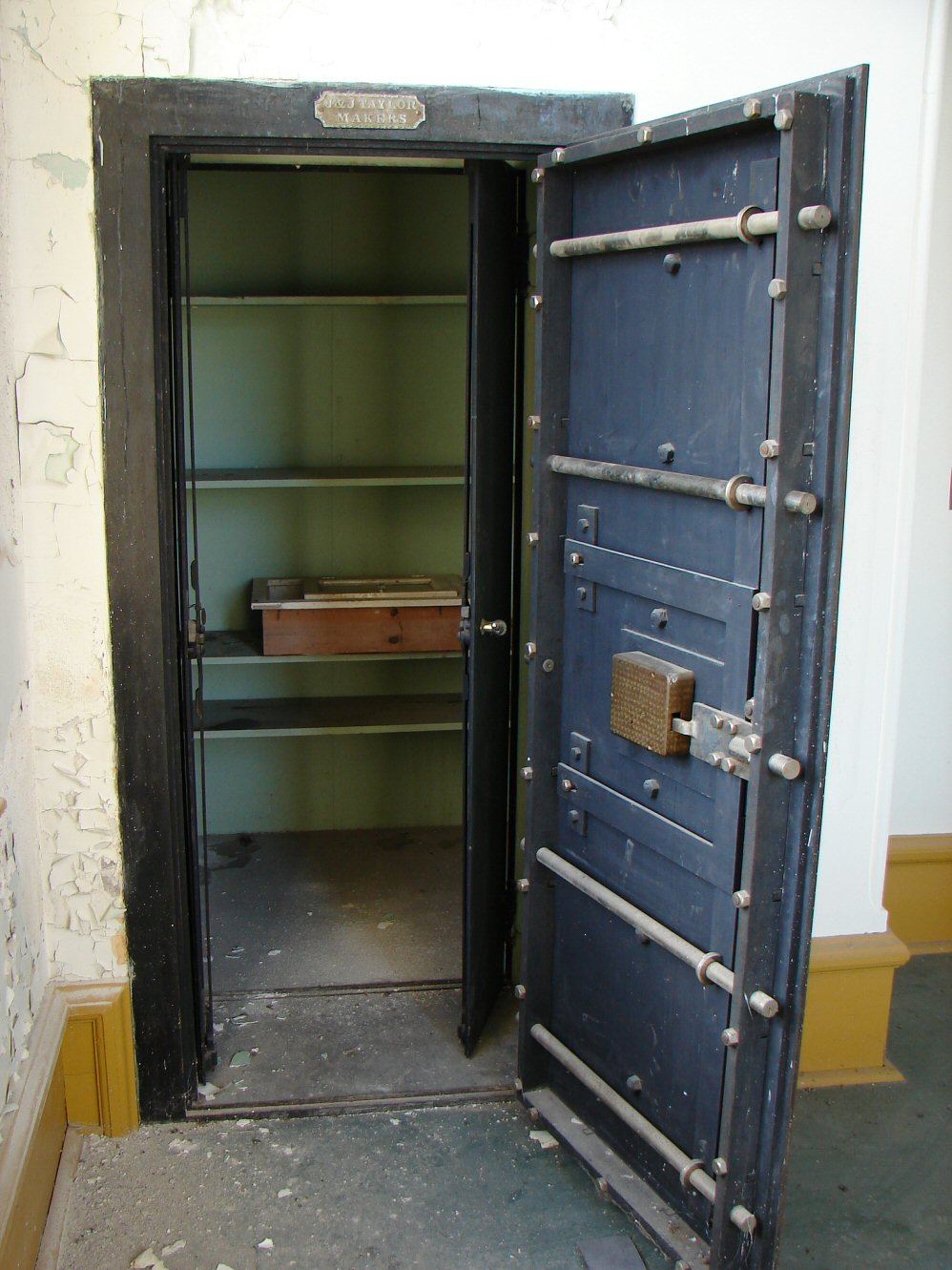 A futuristic digital vault door illustrates secure technology for protecting assets.
