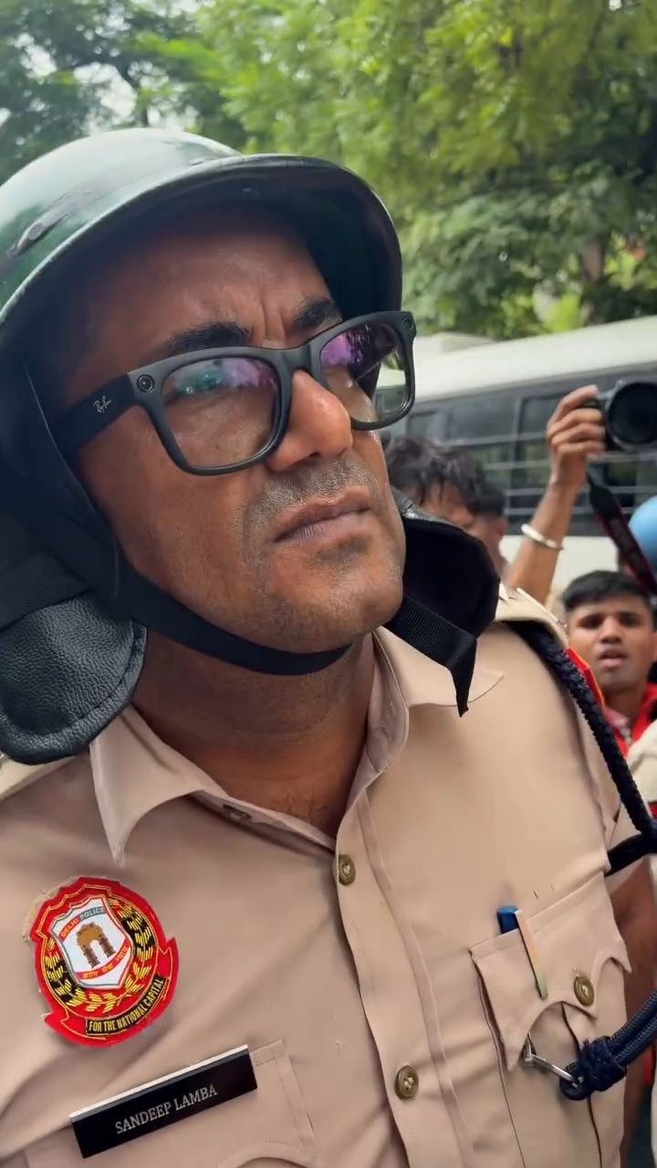 person wearing lightweight smart glasses outdoors in city